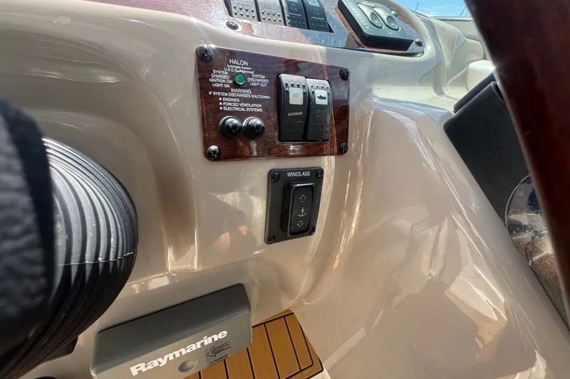 Slide: The Image of Control panel of a 2008 Chaparral Signature 290 boat with Raymarine equipment. - 60