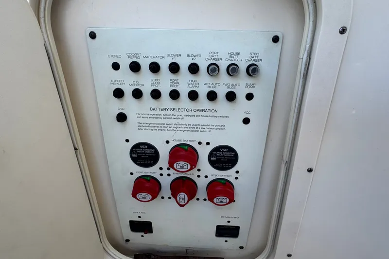Slide: The Image of Control panel of a 2008 Chaparral Signature 290 boat with battery selector switches. - 67