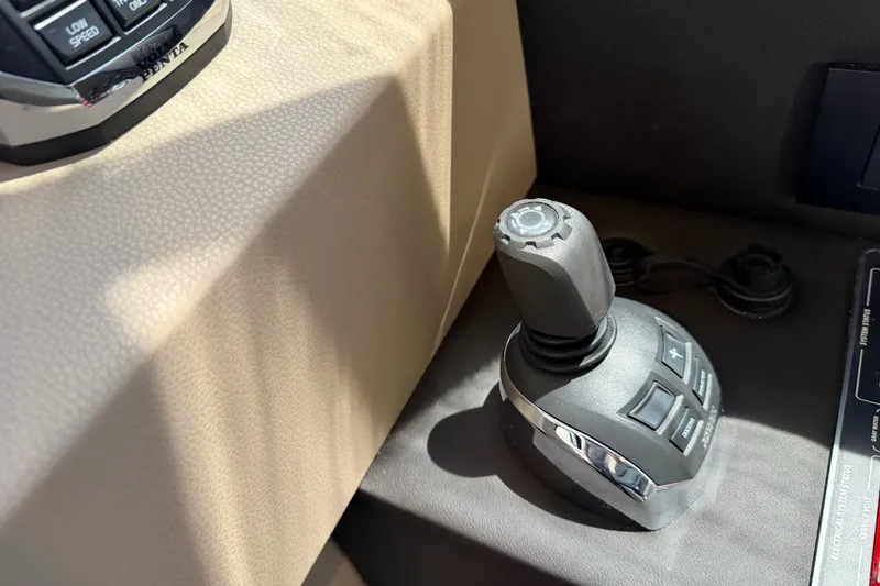 Slide: The Image of Joystick control on 2020 Azimut Fly 50 yacht dashboard, featuring modern navigation technology. - 21