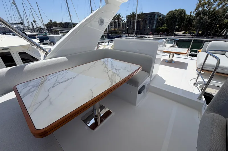 Slide: The Image of Luxurious 2020 Azimut Fly 50 yacht with elegant marble table on deck. - 8