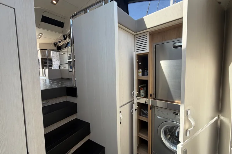 Slide: The Image of Interior of 2020 Azimut Fly 50 yacht with modern cabinetry and appliances. - 25