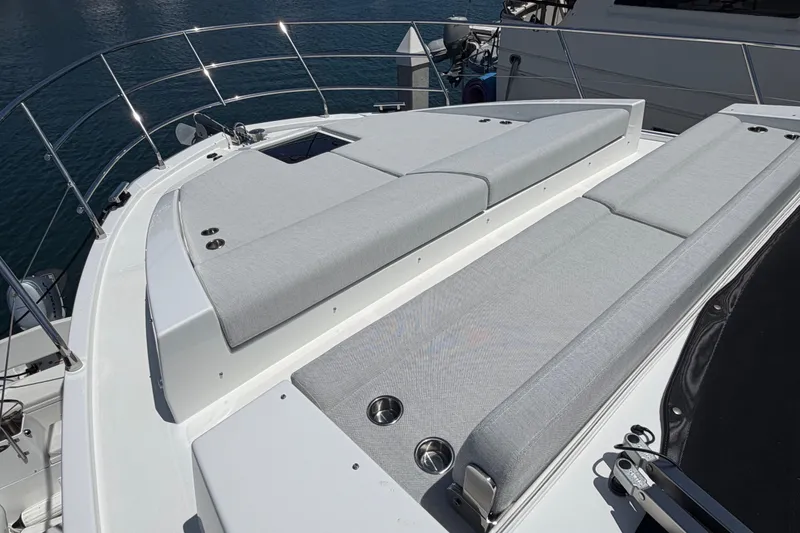 Slide: The Image of Azimut Fly 50 yacht deck, 2020 model, featuring sleek sunbathing area and stainless steel railings. - 11
