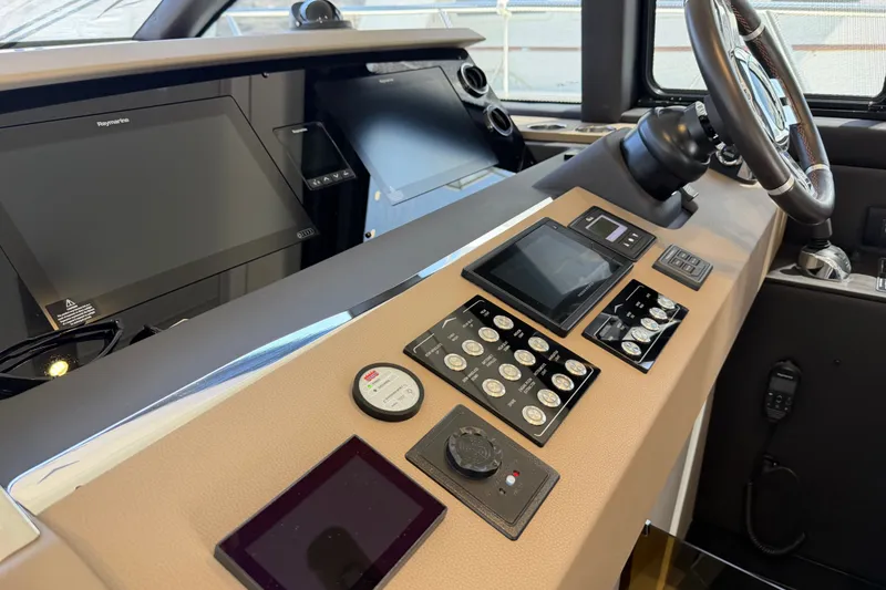 Slide: The Image of Cockpit of 2020 Azimut Fly 50 yacht with advanced navigation controls and displays. - 20