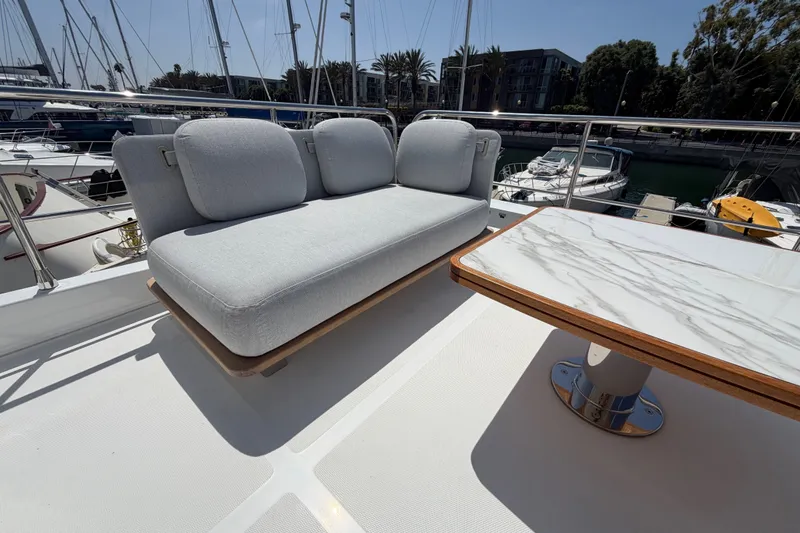 Slide: The Image of Luxurious seating area on 2020 Azimut Fly 50 yacht with marina view. - 3