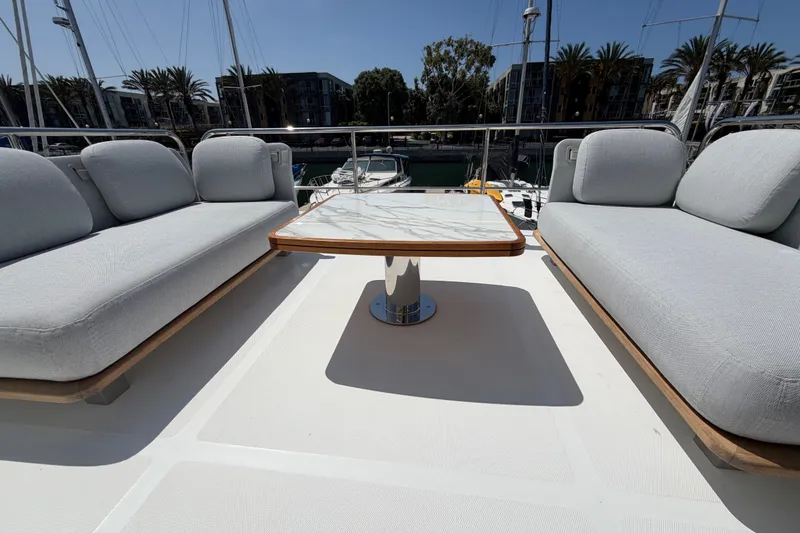 Slide: The Image of Luxurious seating area on 2020 Azimut Fly 50 yacht with elegant table. - 2