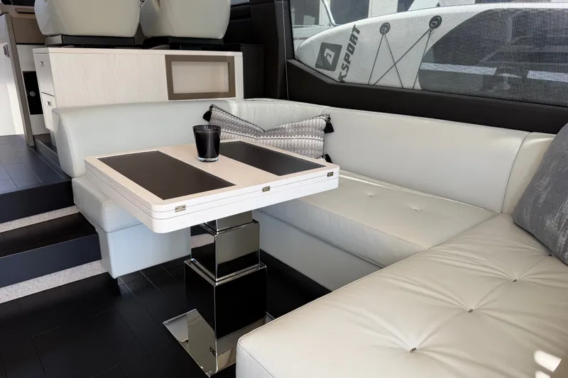 Slide: The Image of Luxurious interior of 2020 Azimut Fly 50 yacht with elegant seating and modern table design. - 18