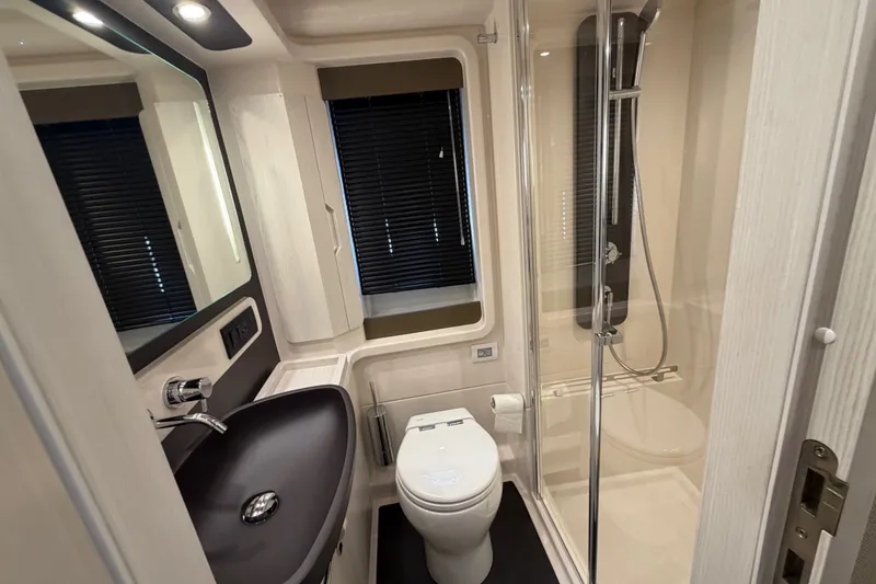 Slide: The Image of Luxurious bathroom in 2020 Azimut Fly 50 yacht with modern fixtures and shower. - 33