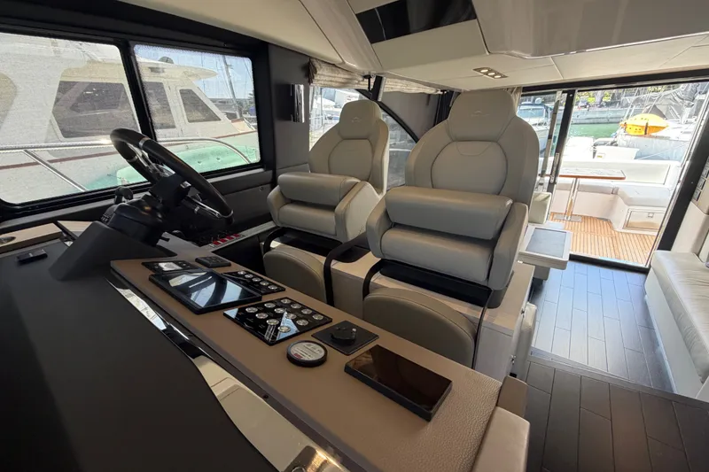 Slide: The Image of Luxurious interior of a 2020 Azimut Fly 50 yacht with modern helm and seating. - 19