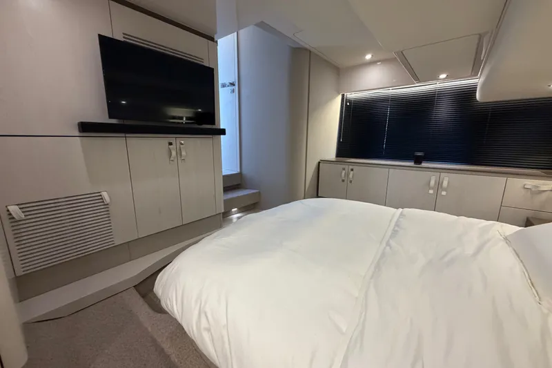 Slide: The Image of Luxurious interior of 2020 Azimut Fly 50 yacht with modern bedroom and TV. - 32