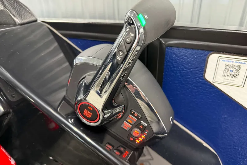 Slide: The Image of Throttle control of 2026 Premier 230 Solaris RF Tritoon boat, featuring advanced controls and manual access. - 14