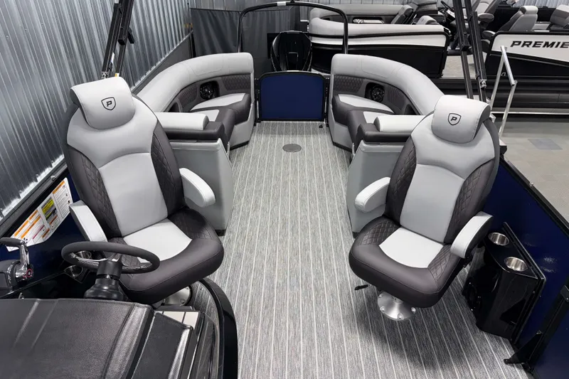 Slide: The Image of 2026 Premier 230 Solaris RF Tritoon interior with luxurious seating and modern design. - 20