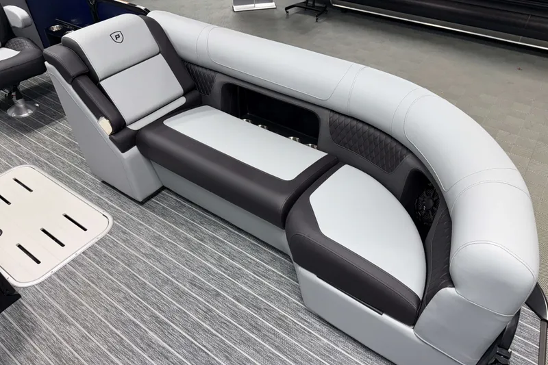 Slide: The Image of Luxurious seating on 2026 Premier 230 Solaris RF Tritoon boat, featuring sleek design and comfort. - 22