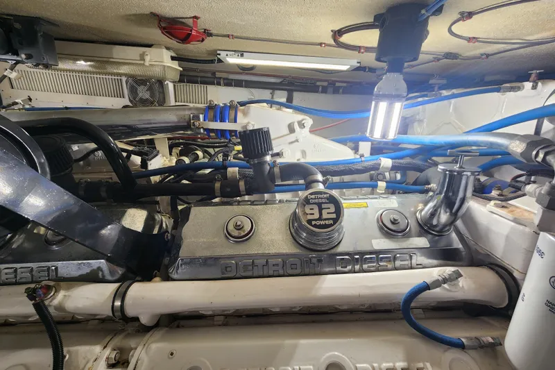Slide: The Image of Engine room of 1999 Hatteras 65 Convertible with Detroit Diesel 92 engine. - 83