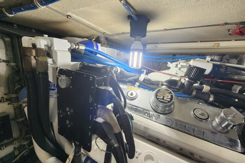 Slide: The Image of Engine room of a 1999 Hatteras 65 Convertible with Detroit Diesel components. - 85