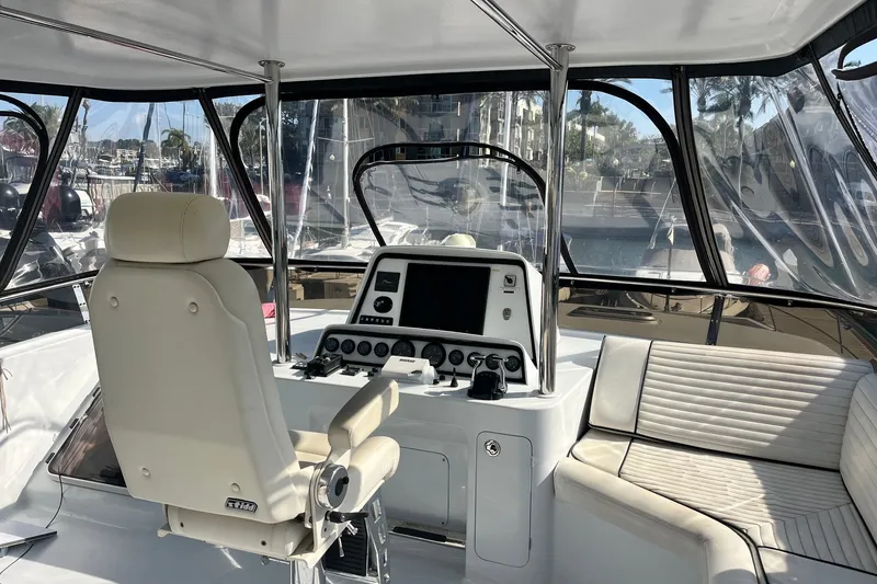 Slide: The Image of Helm of 2003 Pachoud Yachts Power Cat with modern controls and seating. - 36