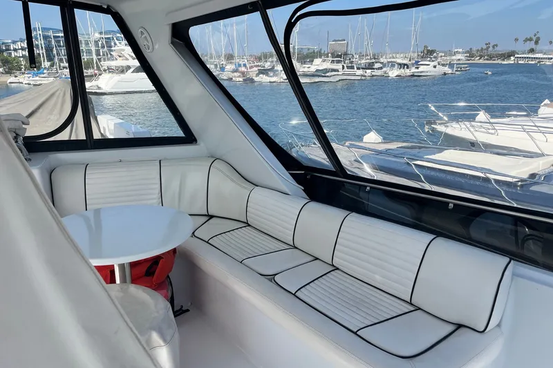 Slide: The Image of Luxurious interior of 2003 Pachoud Yachts Power Cat with marina view. - 38