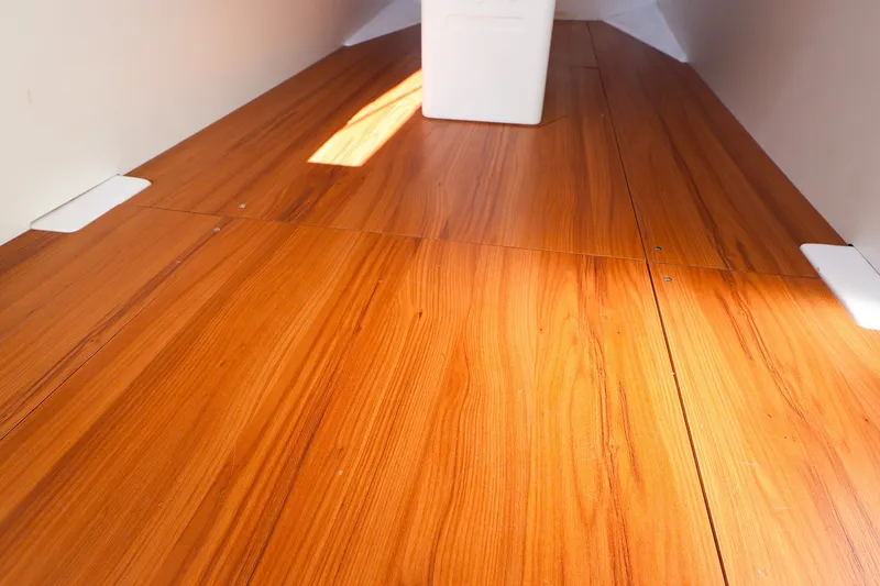 Slide: The Image of Interior view of 2023 J Boats J/99 with sleek wooden flooring. - 54