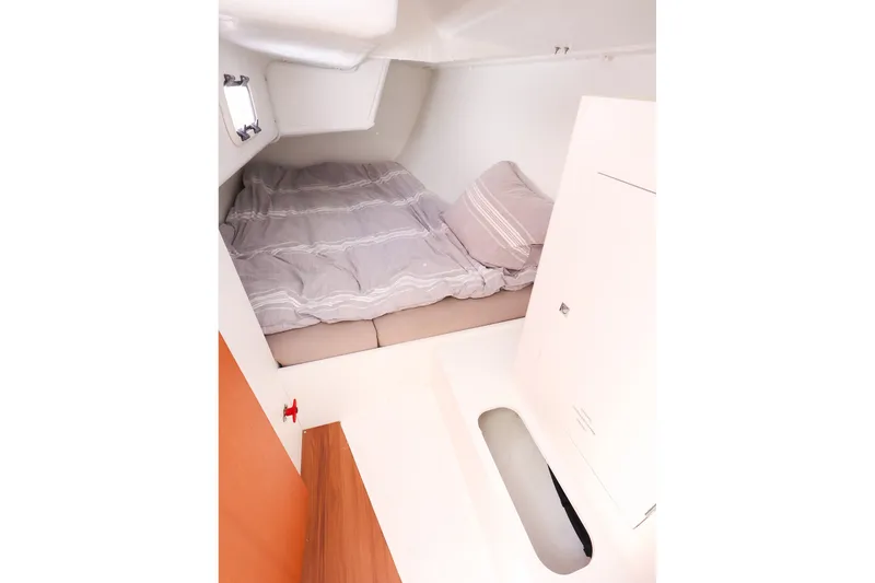 Slide: The Image of 2023 J Boats J/99 cabin interior with cozy bed and minimalist design. - 60