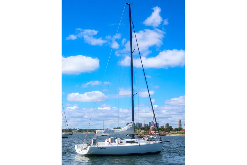 Slide: The Image of 2023 J Boats J/99 sailboat on water under blue sky with clouds. - 5
