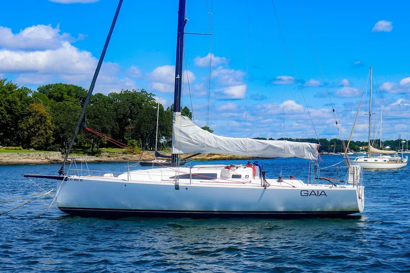 Slide: The Image of 2023 J Boats J/99 sailboat "Gaia" anchored on a sunny day with blue skies. - 1