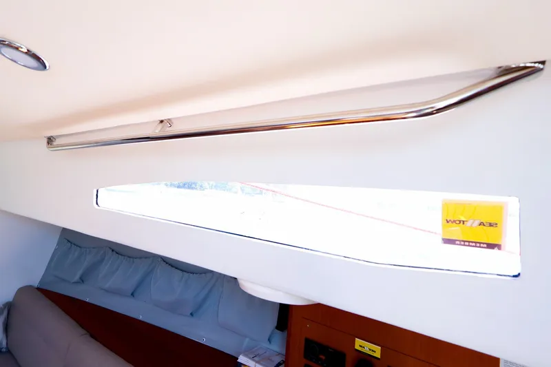 Slide: The Image of Interior of 2023 J Boats J/99 yacht, featuring sleek window and modern design elements. - 47