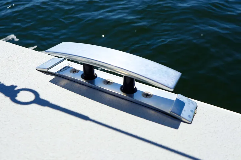 Slide: The Image of Sleek cleat on 2023 J Boats J/99 yacht, docked by the water. - 35