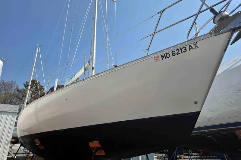 Slide: The Image of 1990 Canadian Sailcraft 34 sailboat on dry dock, registration MD 6213 AX. - 22