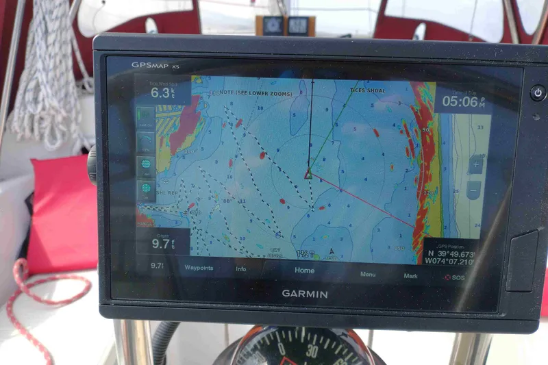 Slide: The Image of Garmin GPS navigation on a 1990 Canadian Sailcraft 34 sailboat, displaying nautical chart. - 28