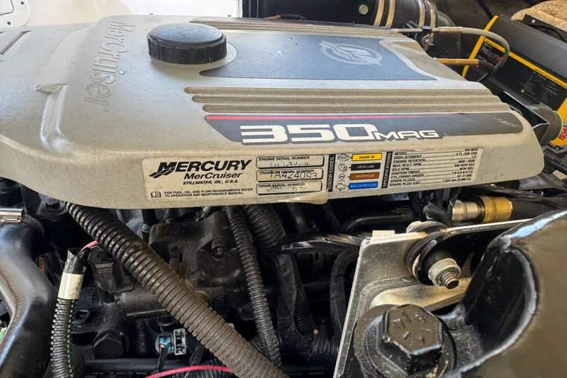Slide: The Image of Mercury MerCruiser 350 MAG engine in a 2009 Rinker 248 Captiva Deckboat. - 14