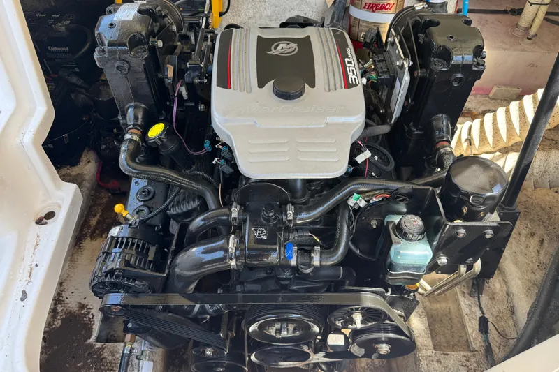 Slide: The Image of Engine of a 2009 Rinker 248 Captiva Deckboat, featuring a MerCruiser 350 engine. - 15