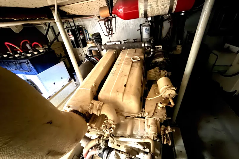 Slide: The Image of 1974 Willard Vega Voyager engine room with visible machinery and components. - 32