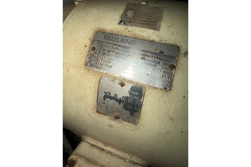 Slide: The Image of 1974 Willard/Vega Voyager motor with Reuland label and specifications. - 23