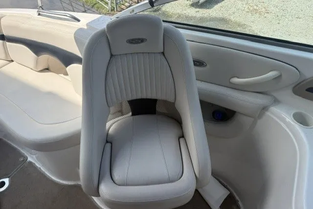 Slide: The Image of 2003 Chaparral 265 SSi boat interior with plush seating and elegant design. - 12