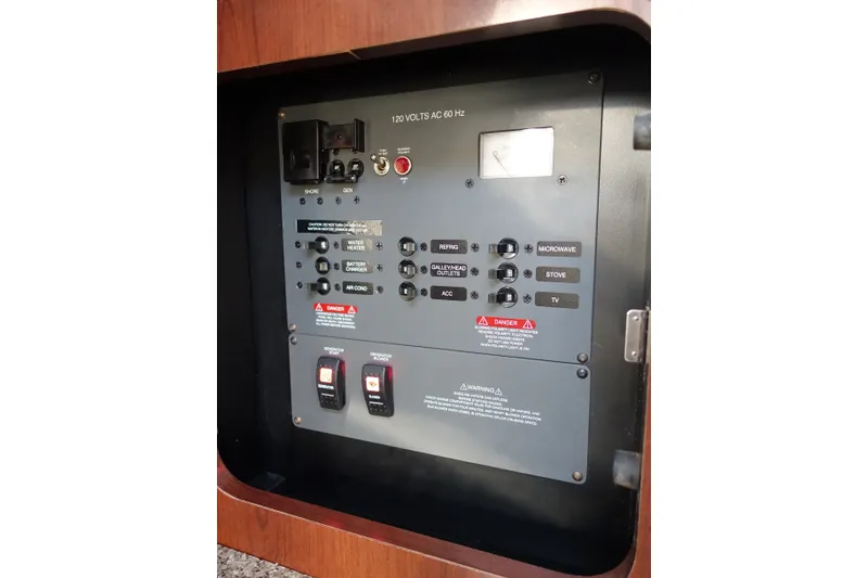 Slide: The Image of Electrical control panel on a 2017 Robalo R305 Walkaround boat. - 13