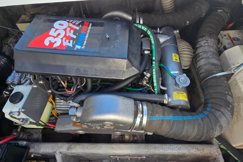 Slide: The Image of Engine compartment of a 1995 Mainship 31 Sedan Bridge with 350 EFI motor. - 40
