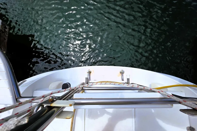 Slide: The Image of Overhead view of a 1995 Catalina 30 MkIII sailboat deck and water. - 18