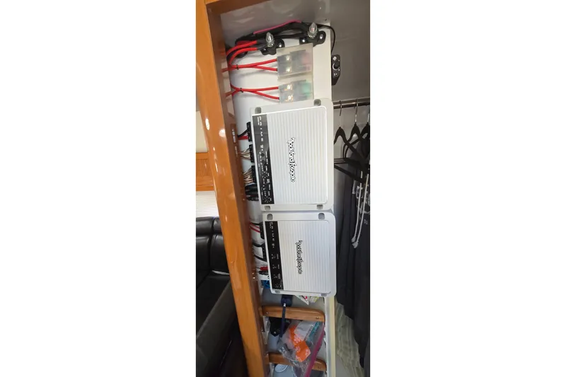 Slide: The Image of Audio equipment installation in a 2000 Four Winns 328 Vista boat interior. - 25