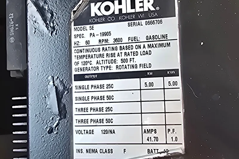 Slide: The Image of Kohler generator label on 2000 Four Winns 328 Vista, detailing specifications and ratings. - 32
