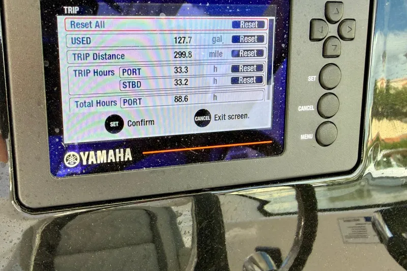Slide: The Image of Yamaha boat display showing trip data on Pursuit DC 266 Dual Console, 2022 model. - 28
