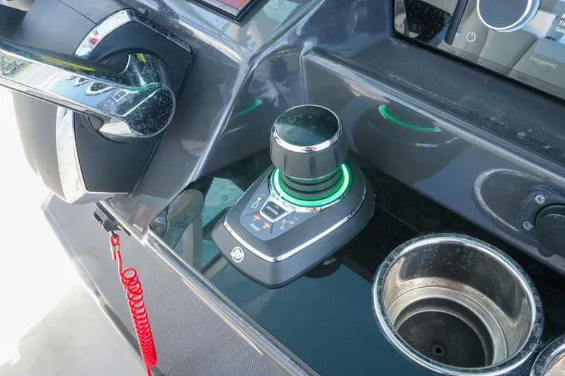 Slide: The Image of Control panel of 2023 Blackfin 332 CC boat with joystick and throttle. - 18