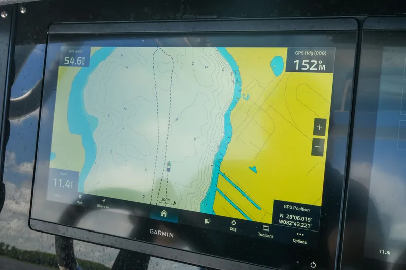 Slide: The Image of Garmin GPS display on 2023 Blackfin 332 CC boat, showing navigation map and speed. - 45