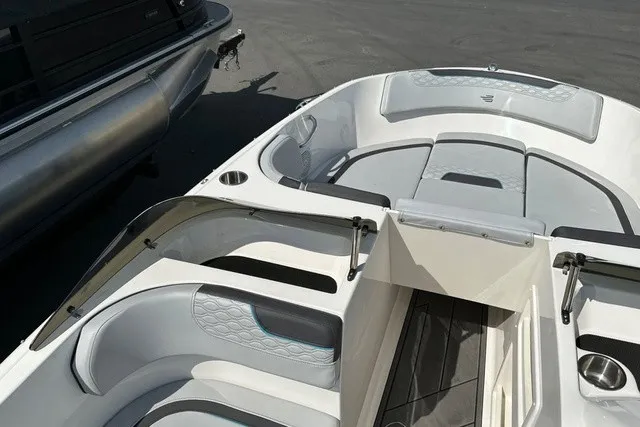 Slide: The Image of The image shows the cockpit of a 2024 Bayliner M17 with modern seating and sleek lines. - 14