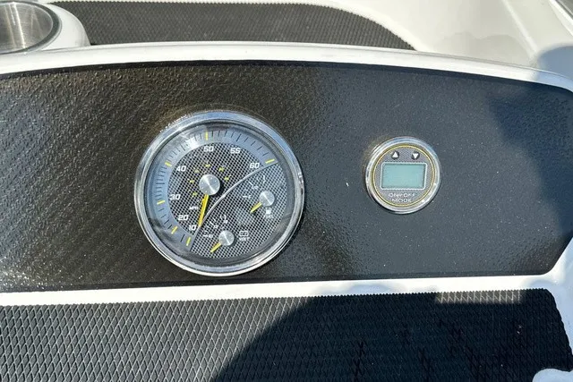 Slide: The Image of The image shows the dashboard of a 2024 Bayliner M17 with a speedometer and digital display. - 20