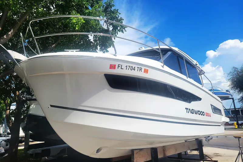 Slide: The Image of 2023 Jeanneau NC 895 boat on display, featuring sleek design and modern amenities. - 3