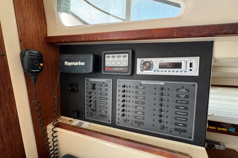 Slide: The Image of Control panel of a 2007 Gemini 105 MC sailboat with Raymarine equipment. - 13