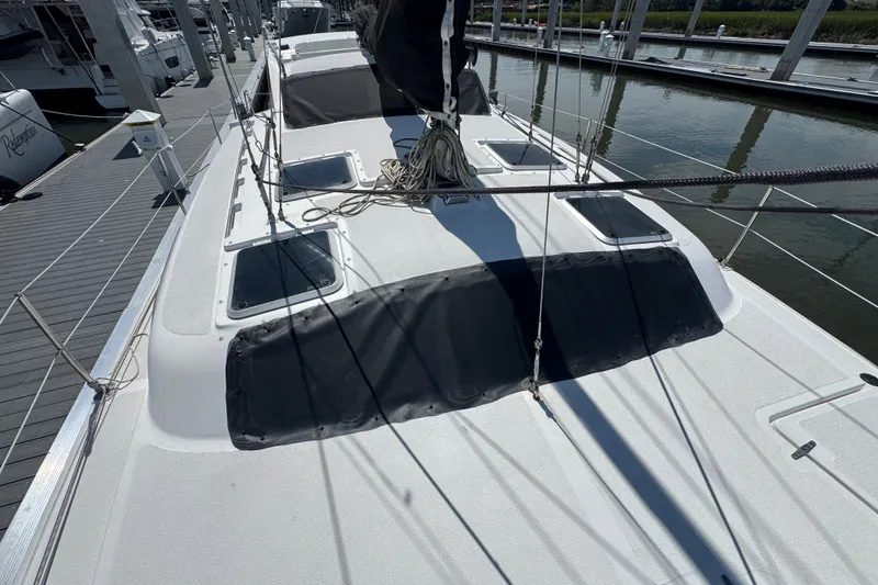 Slide: The Image of Sailboat deck view of 2007 Gemini 105 MC at marina dock. - 9