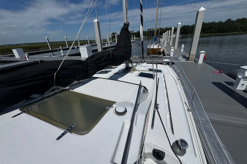 Slide: The Image of Sailboat docked at marina, Gemini 105 MC, 2007 model, clear sky. - 8