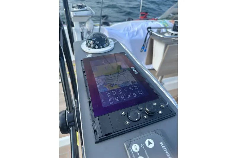 Slide: The Image of Navigation system on 2024 J Boats J/45 sailboat, featuring a B&G display and compass. - 10