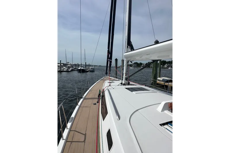 Slide: The Image of 2024 J Boats J/45 sailboat docked, showcasing sleek deck design and marina view. - 2