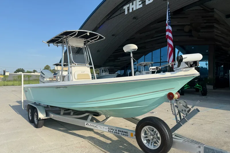 Slide: The Image of 2020 Bulls Bay 2400 XS boat on trailer, parked outside a building. - 4